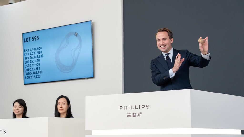 Benoît Repellin runs an auction at Phillips image