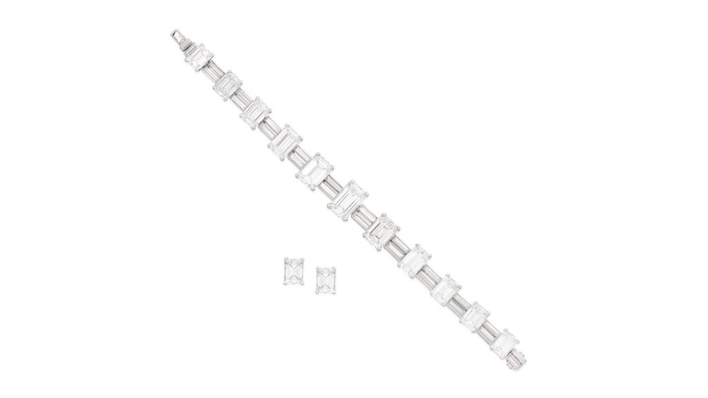 A set comprising an Aldao bracelet and a pair of ear studs. The bracelets has step-cut diamonds graduating in size toward the center, alternating between links with duos of baguette-cut diamonds. Each of the ear studs contains a step-cut diamond at Bonhams image