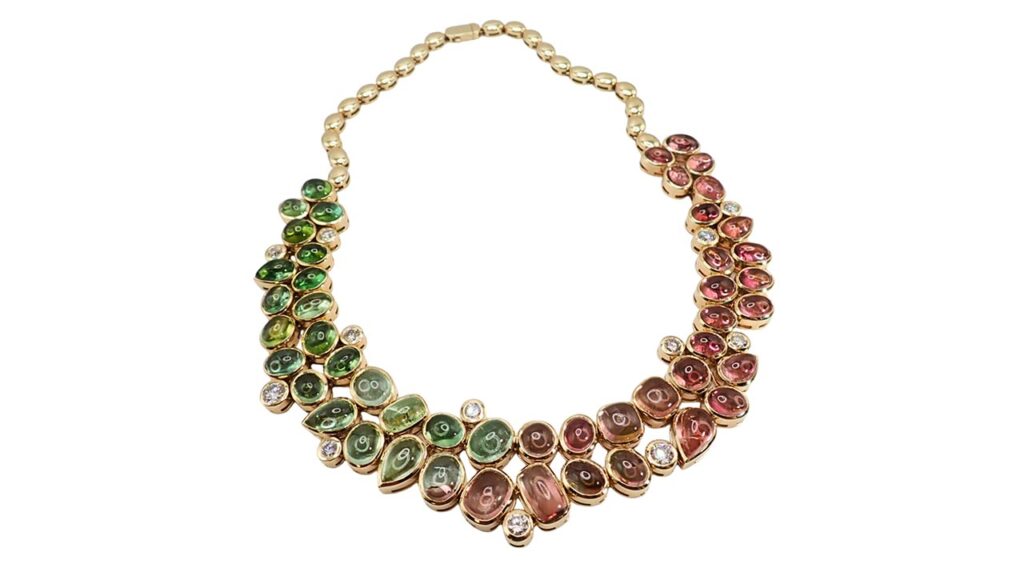 A yellow gold custom necklace with 201.64 carats of cabochon tourmalines with a variety of pink, green, and bicolor stones, and 6.63 carats of accent diamonds, Jewelers of America image