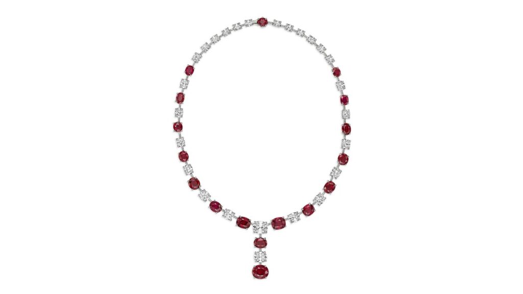 This David Morris necklace comprises oval and cushion mixed-cut Burmese rubies weighing from 1.02 to 5.03 carats, alternating between cushion and round diamonds. The two large diamonds are a 2.23-carat, F, VS2 and a 3.34-carat, F, VVS2 stone at Christie's image