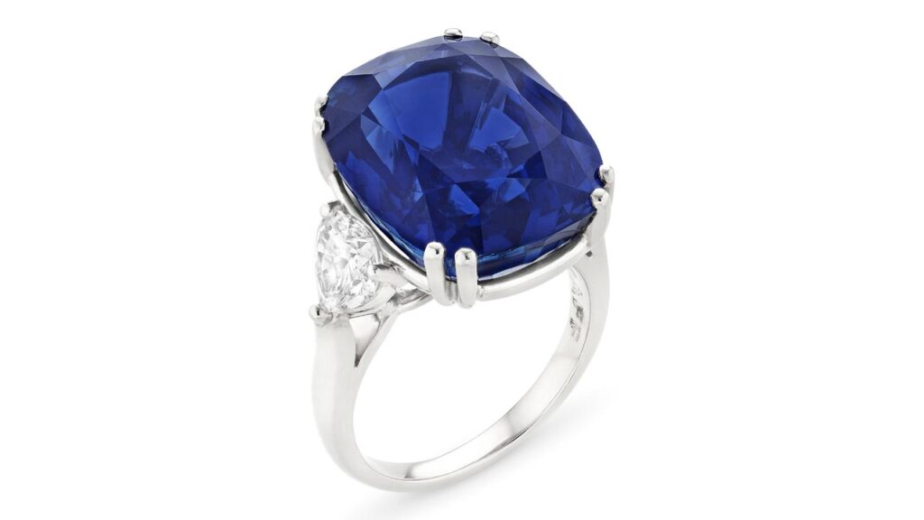 A Graff ring centering a cushion mixed-cut, 30-carat Ceylon sapphire between heart-shaped diamonds at Christie's image