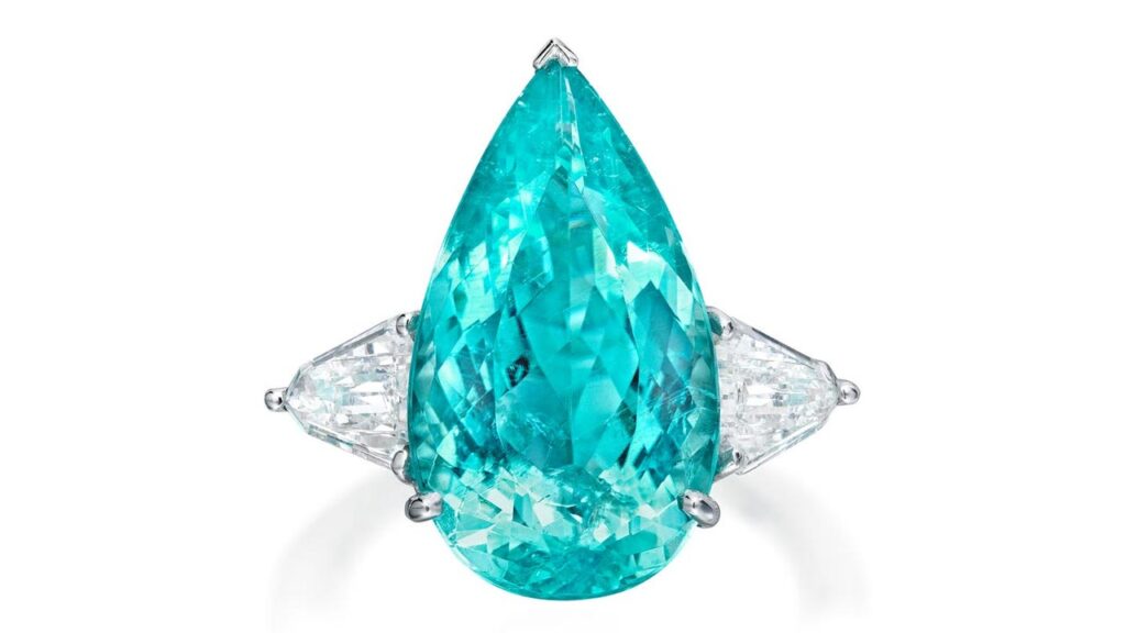 This ring bears a pear-shaped, 9.30-carat Mozambique Paraiba tourmaline between shield-shaped diamonds at Phillips image