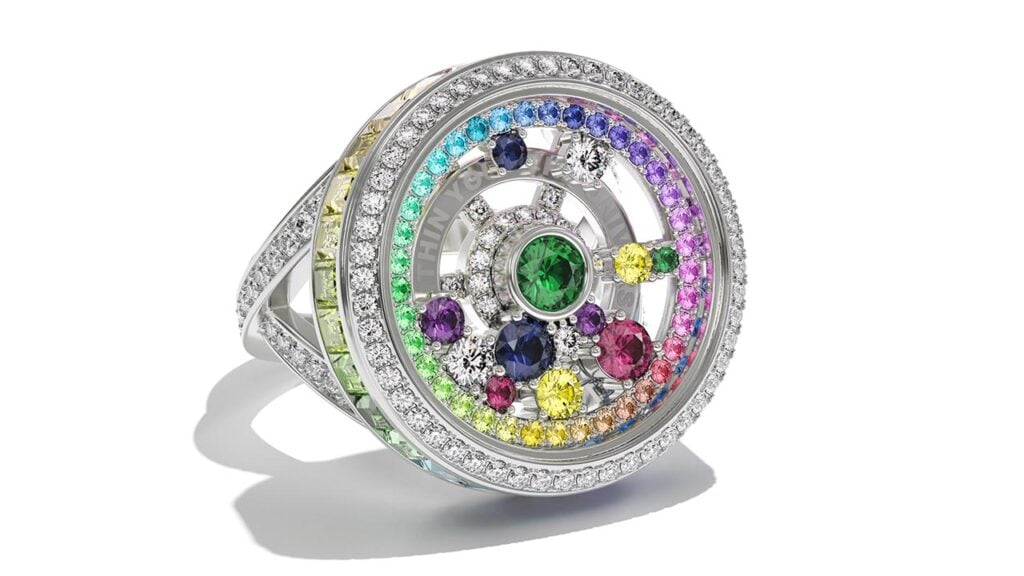The Universe Lives Quietly Within You ring, featuring 2.58 carats of baguette-cut sapphires, 0.74 carats of round sapphires, 0.28 carats of round tsavorites, and 0.97 carats of diamonds. Jewelers of America image