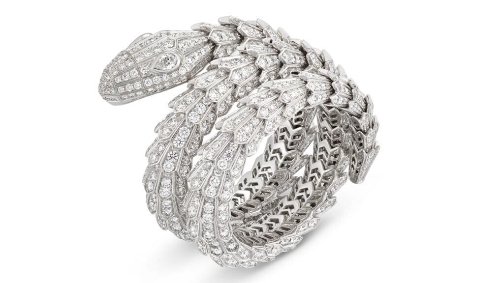 A Bulgari Serpenti bangle featuring circular-cut diamonds with pear-shaped diamond eyes at Christie's image