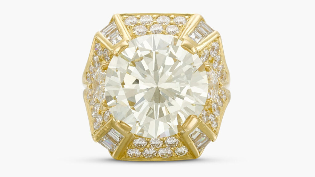 This ring centers a brilliant-cut, 10.29-carat, M, VVS2 diamonds, within a frame of step- and brilliant-cut and heart-shaped diamonds at Sotheby's image