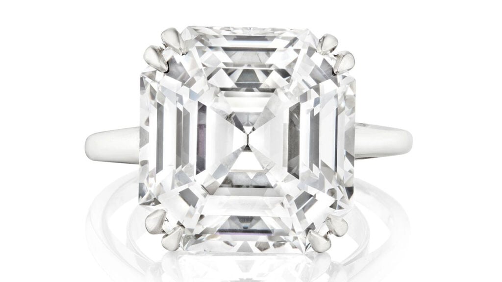A ring bearing an emerald-cut, 11.20-carat, E-color, VS1 diamond at Bonhams image
