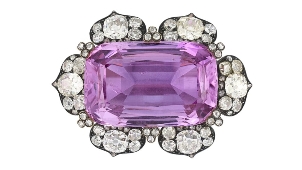 A brooch from around 1890 centers an antique cushion-shaped pink imperial topaz in a frame of old circular-, cushion- and rose-cut diamonds. It made more than six times its high presale price at Christie's image