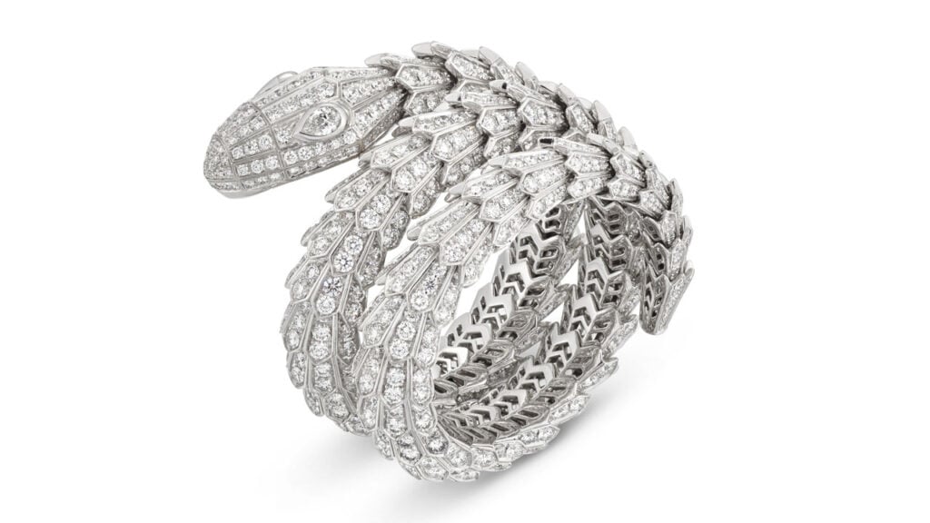 This Bulgari Serpenti bangle features circular-cut diamonds with pear-shaped diamond eyes at Christie's image