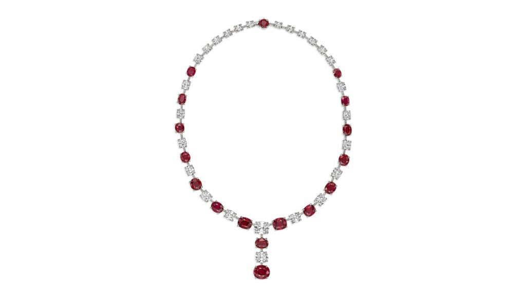 A David Morris necklace comprises oval and cushion mixed-cut Burmese rubies weighing from 1.02 to 5.03 carats, alternating between cushion and round diamonds. The two large diamonds are a 2.23-carat, F, VS2 diamond and a 3.34-carat, F, VVS2 stone at Christie's image