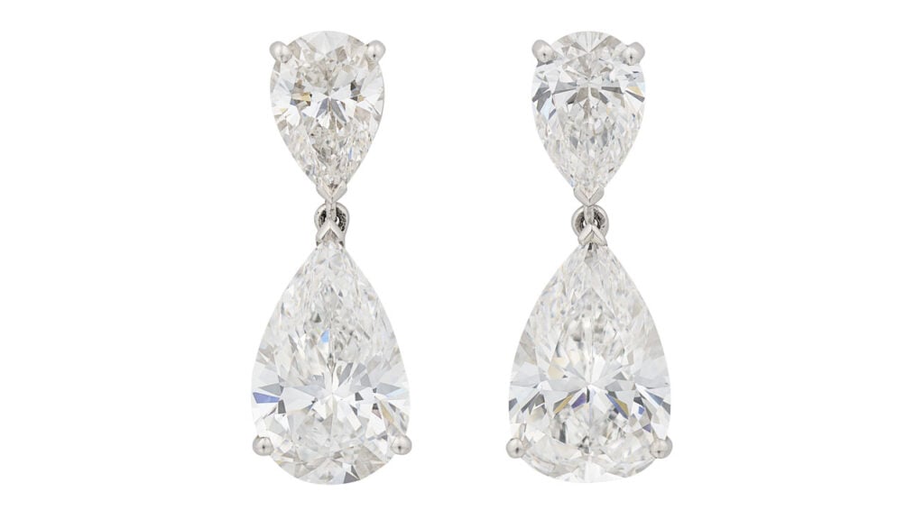This pair of Graff earrings contains two pear brilliant-cut, D-color, internally flawless diamonds of 3.65 and 3.71 carats suspended from pear-shaped diamonds at Christie's image