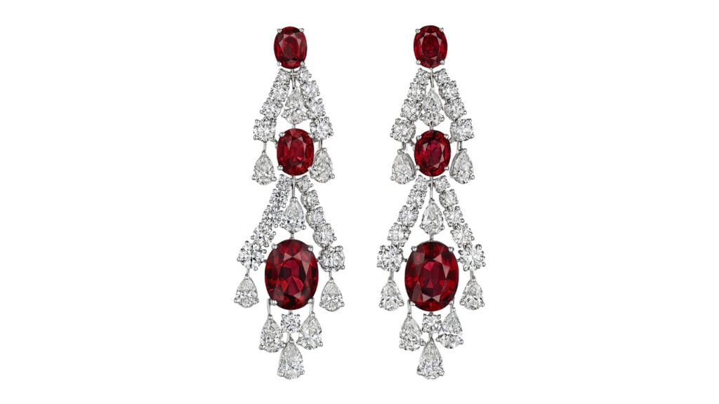 This pair of Graff earrings bears six oval mixed-cut Burmese spinels weighing a total of 30.11 carats, decorated with pear and round diamonds at Christie's image