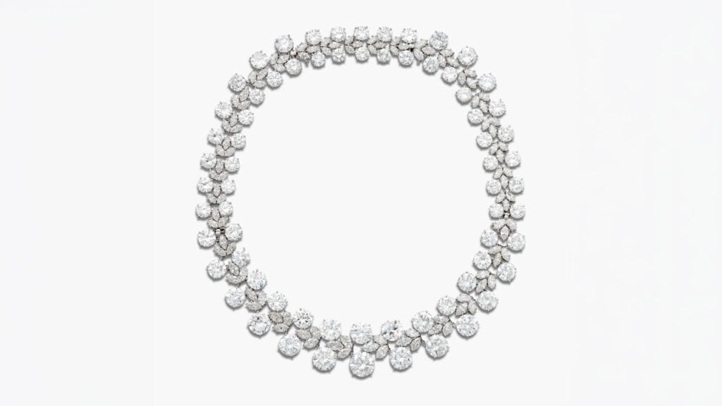 A Harry Winston necklace, which can also be converted into two bracelets. It comprises graduated pairs of round diamonds alternating with marquise-shaped diamond clusters at Sotheby's image