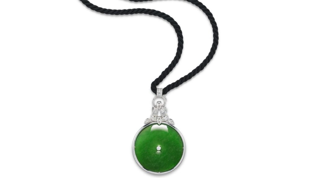 A necklace sporting a Burmese jadeite, suspended from variously cut diamonds, made more than 38 times its high estimate at Christie's image
