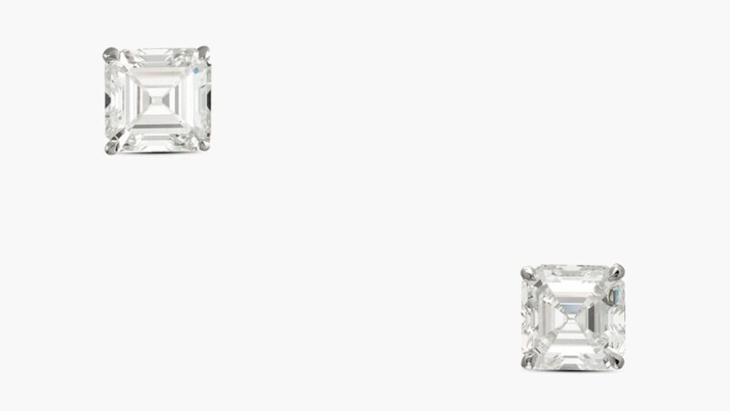 A pair of earrings bearing a square emerald-cut, 5.01-carat, J, VVS2 and a square emerald-cut, 5.02-carat, I, VVS1 diamond at Sotheby's image