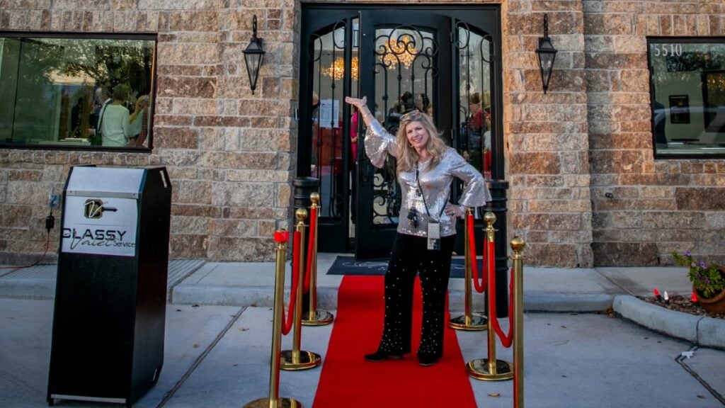 Amber Gustafson in front of her Texas store image