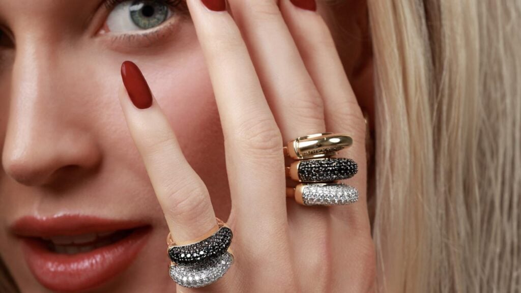 Luna rings with colorless and black diamonds on model image