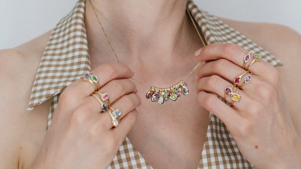 Birthstone pendants and signet rings by Emily Warden Designs in yellow gold with garnet, amethyst, aquamarine, diamond, emerald, alexandrite, ruby, peridot, sapphire, pink tourmaline, citrine, and tanzanite image