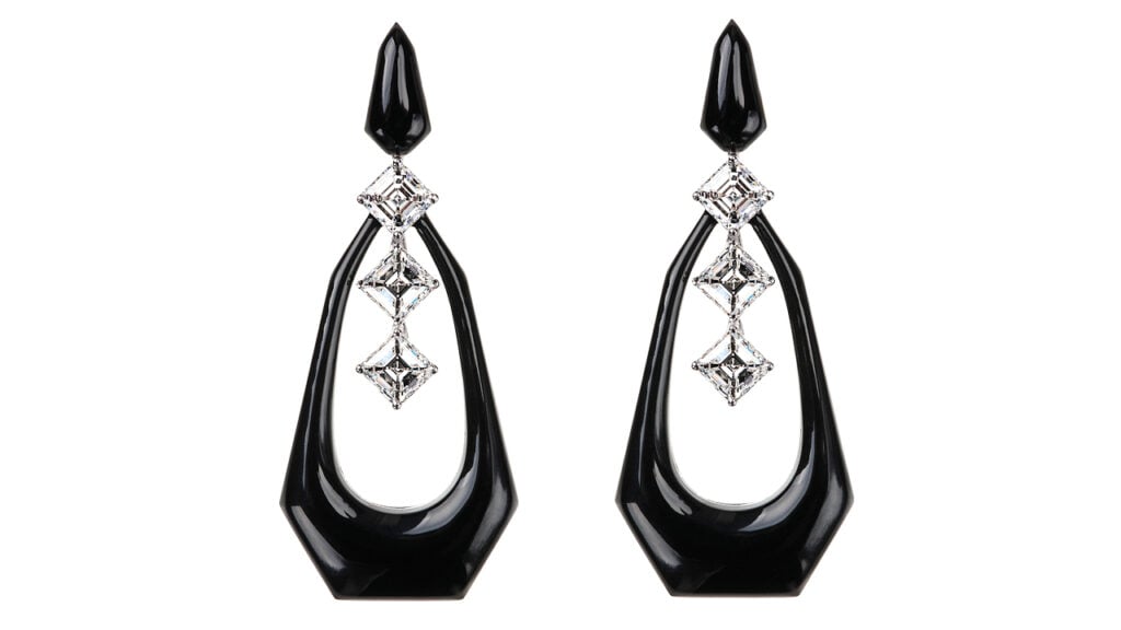 Earrings from Nikos Koulis’s Oui collection in black enamel, white gold and diamonds image