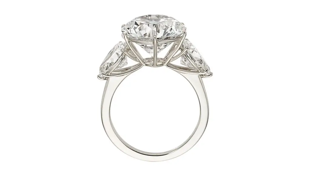 A ring featuring a round brilliant, 5.90-carat, D, VVS2 diamond and two additional pear-shaped diamonds at Heritage Auctions image