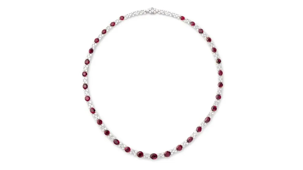 A necklace containing oval and circular-cut rubies, accented with brilliant- and princess-cut diamonds at Phillips image