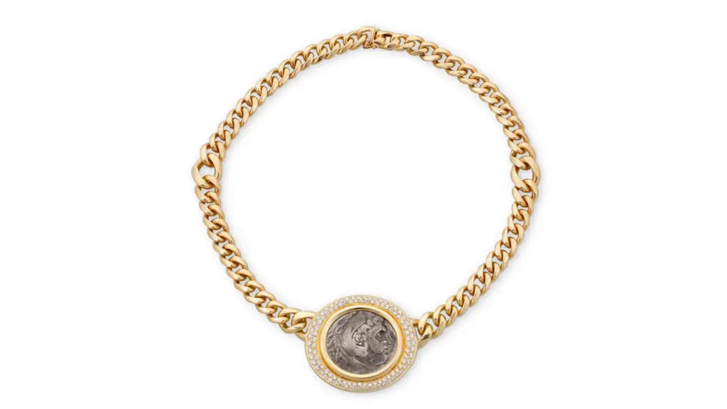 A Bulgari necklace centering an ancient coin from Alexander the Great dating from 336 to 323 BCE, framed with 2.75 carats of round diamonds at John Moran image