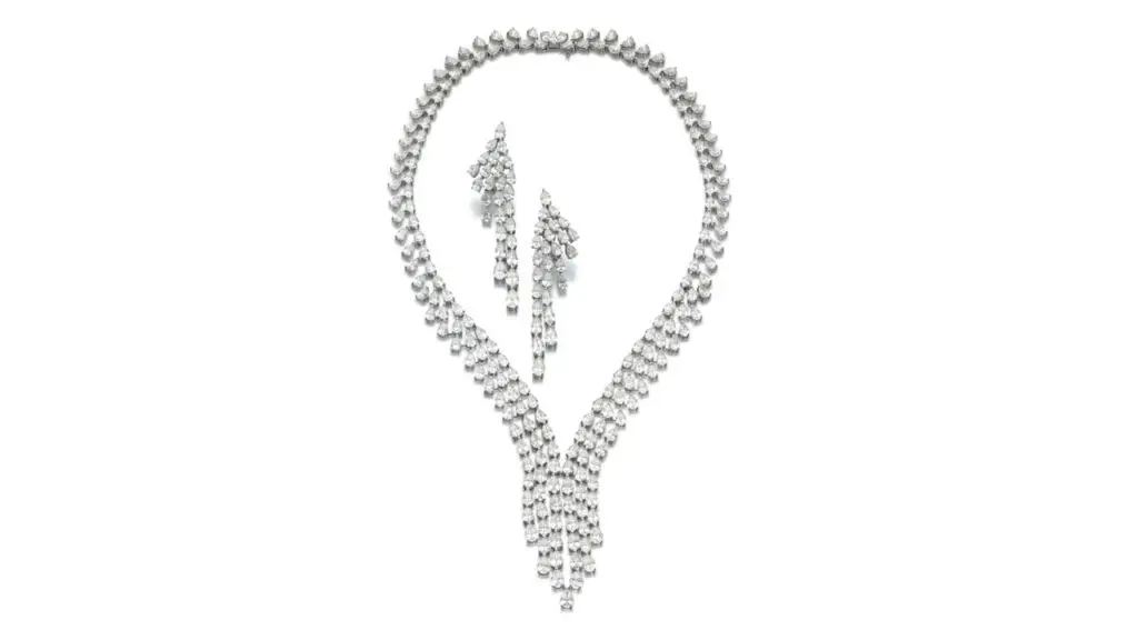 This Schreiner set includes a necklace and a pair of earrings. The necklace sports an articulated fringe set throughout with 99.63 carats of pear-shaped diamonds and a pair of similarly set pendant earrings with 34.65 carats of diamonds at Sotheby's image