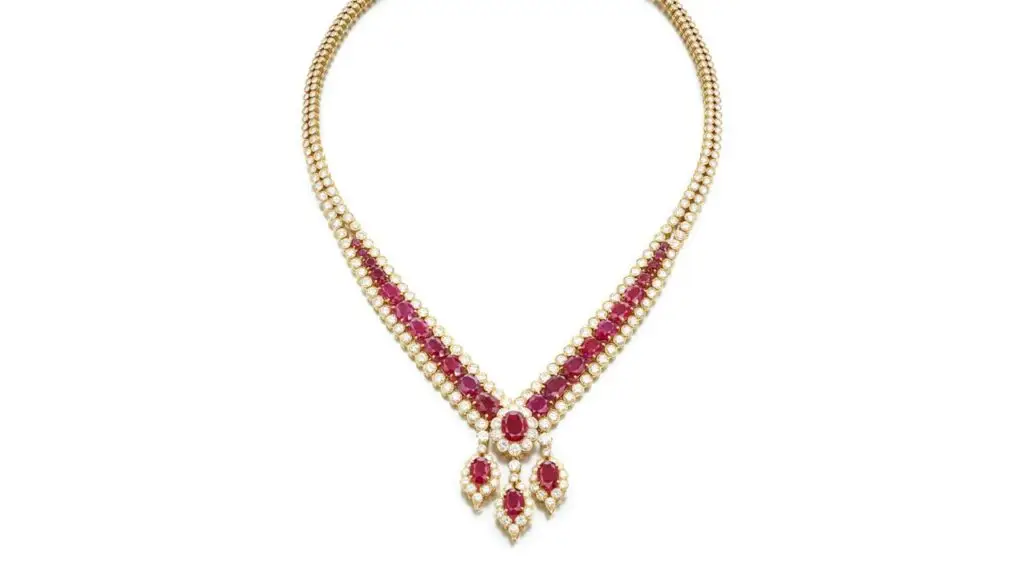 This Van Cleef & Arpels Gazelle necklace comprises a series of graduated oval rubies between brilliant-cut diamonds, centering an oval, 5.20-carat Burmese ruby within brilliant-cut diamonds. It also suspends three detachable pendants containing oval Burmese rubies weighing 3.56, 3.39 and 2.79 carats at Sotheby's image
