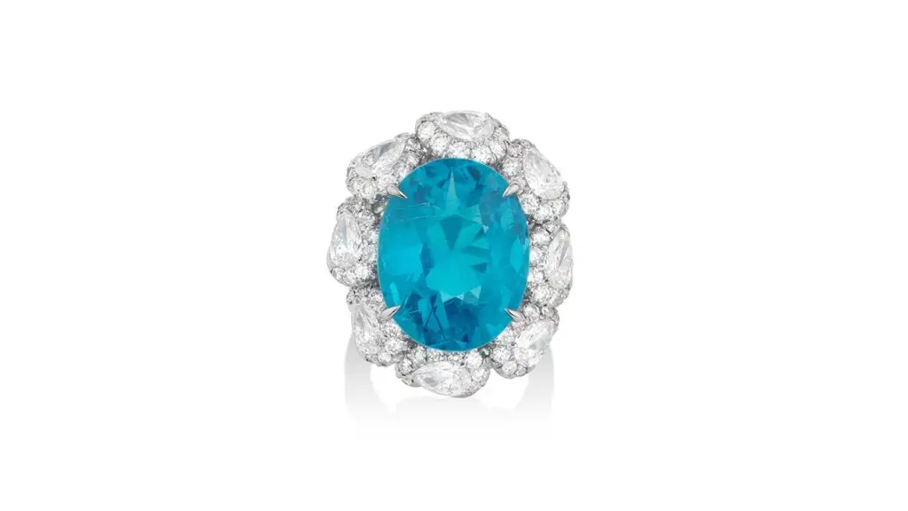 The auction house sold this ring bearing an oval, 20.08-carat Paraiba tourmaline center stone in a pear-shaped and brilliant-cut diamond surround at Phillips image