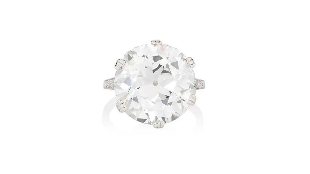 A brilliant-cut, 13.02-carat, G, VVS2 diamond ring with single- and rose-cut diamonds on the shoulders at Phillips image