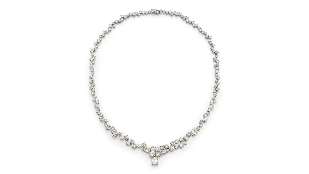 A necklace sporting a detachable emerald-cut, 1.66-carat, F, VS1 diamond, with the remaining diamonds weighing 28.20 carats at Bonhams image