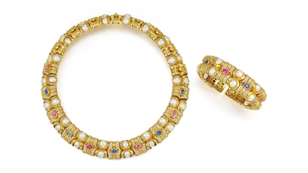 A necklace and bracelet featuring round and cultured pearls as well as oval-shaped blue and pink sapphires with an estimated total weight of 4.90 carats, adorned with around 7.50 carats of round brilliant-cut diamonds at Bonhams image
