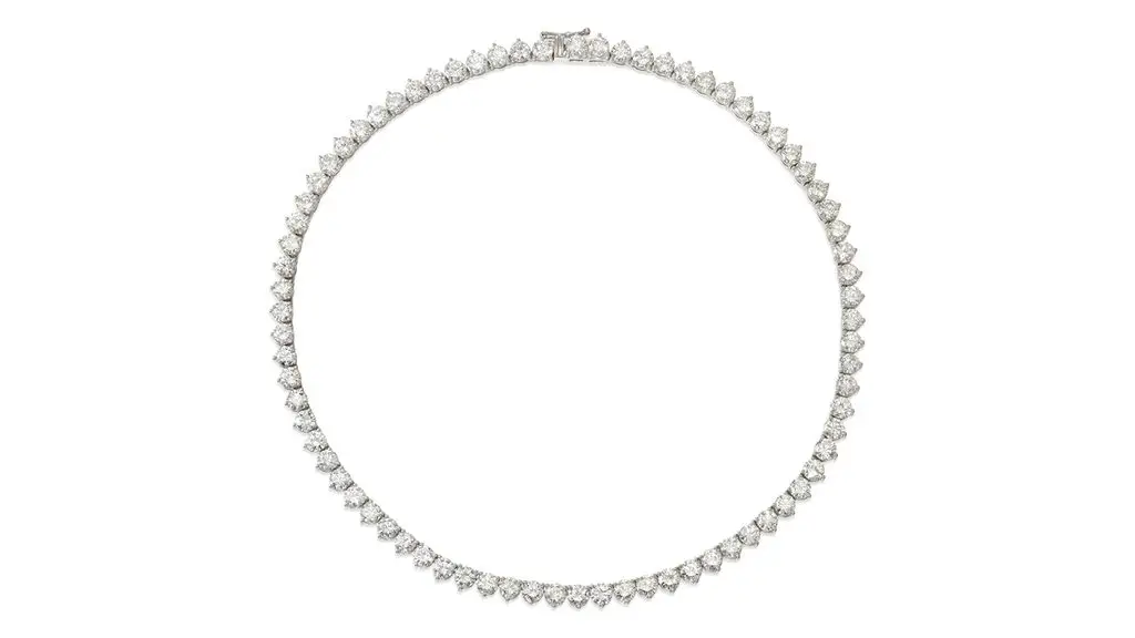 This necklace sports a line of approximately 75 round brilliant-cut diamonds weighing 37.70 carats in total, in I to K color and mostly VS clarity at Bonhams image