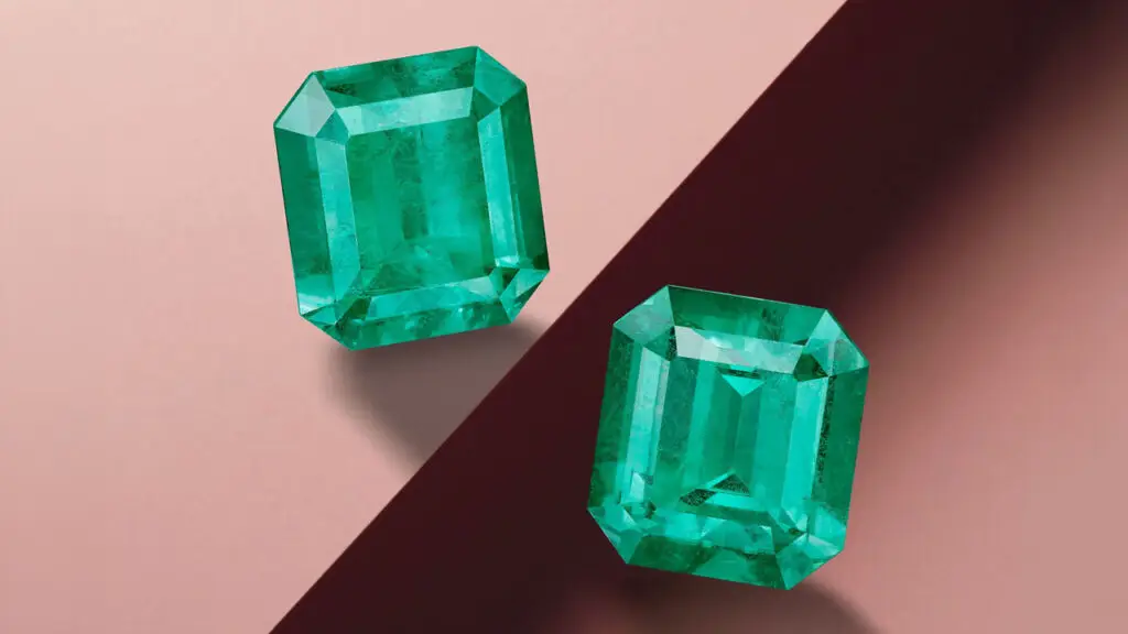 A pair of unmounted octagonal step-cut Colombian emeralds weighing 30.12 and 31.20 carats at Bonhams image