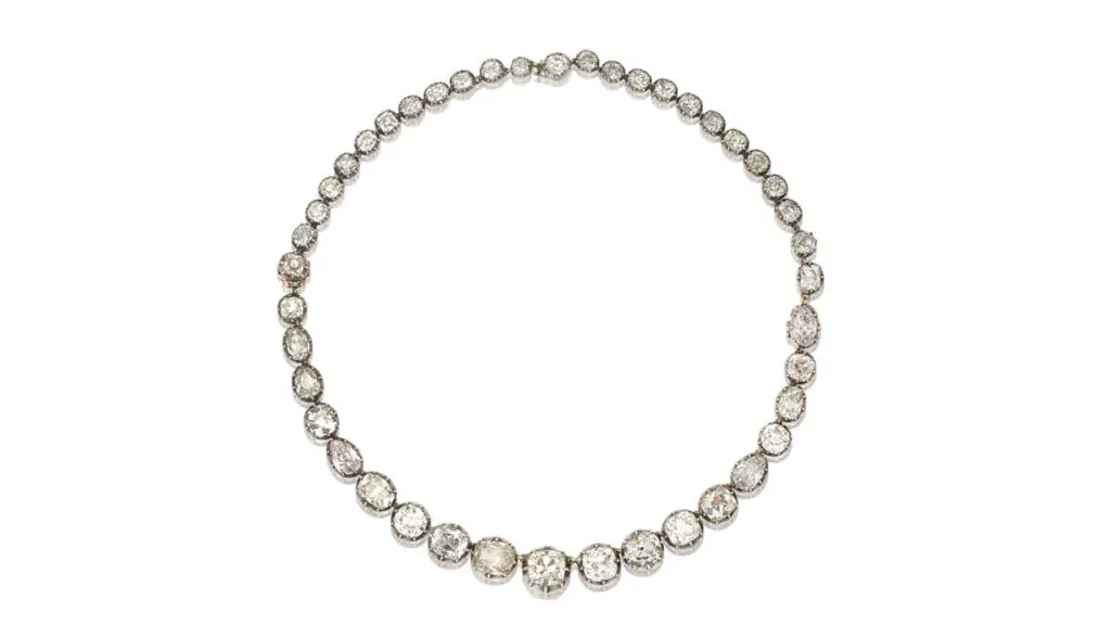 This diamond rivière necklace, which can turn into a pair of bracelets, dates to the 19th century and contains old cushion-shaped, pear and brilliant-cut diamonds that increase in size toward the center. The largest cushion weighs 3.32 carats at Bonhams image