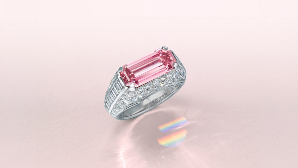 A Bulgari Trombino ring from 1970 bears a cut-cornered rectangular step-cut, 3.17-carat, fancy-vivid-pink, VS1, type IIa diamond with round and baguette-cut diamonds at Christie's image