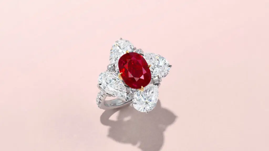 An oval brilliant-cut, 5.07-carat Burmese ruby is the star of this ring. It is framed by four pear brilliant-cut diamonds weighing 1.70, 1.84, 2 and 2.02 carats, and has round diamonds on the band at Christie's image