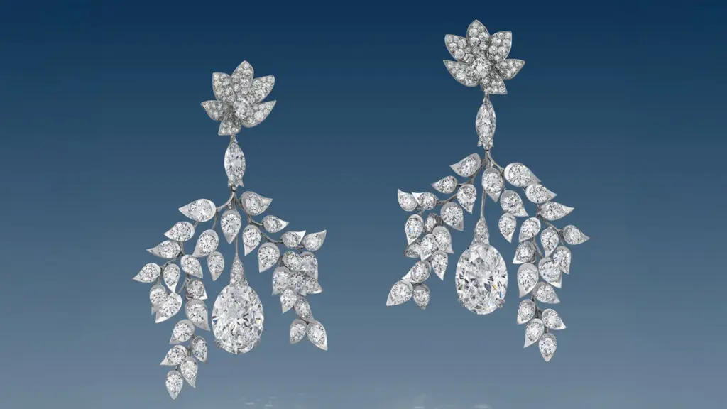 This pair of diamond earrings by Boehmer et Bassenge comprises two oval brilliant-cut diamonds, one an 11.03-carat, D, internally flawless and the other an 11.13-carat, D-flawless diamond suspending from round brilliant- and marquise brilliant-cut diamonds at Christie's image