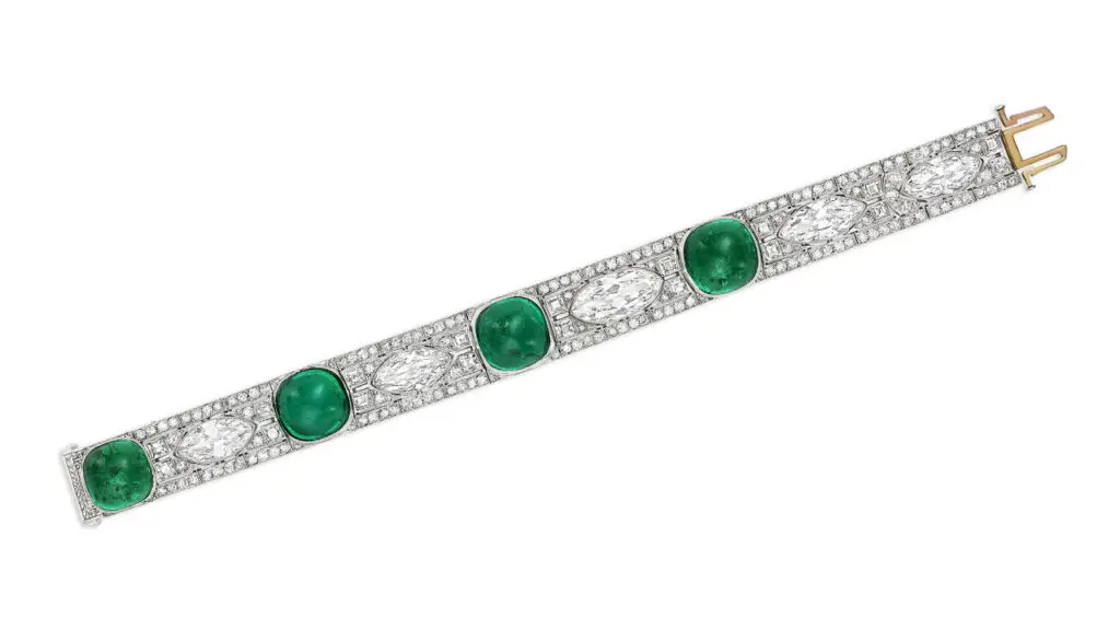 A Tiffany & Co. Art Deco bracelet from around 1930 features square cushion pyramidal Colombian emerald cabochons alternating with marquise, square and old-cut diamonds at Christie's image