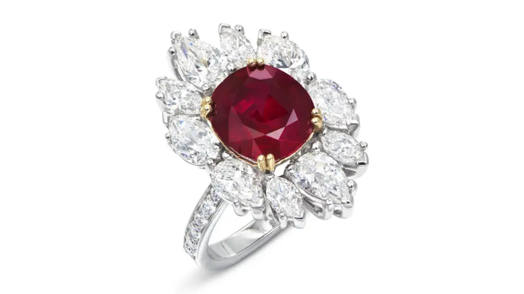 An antique cushion-cut, 4.28-carat Burmese ruby in a diamond surround lies at the center of this ring at Christie's image