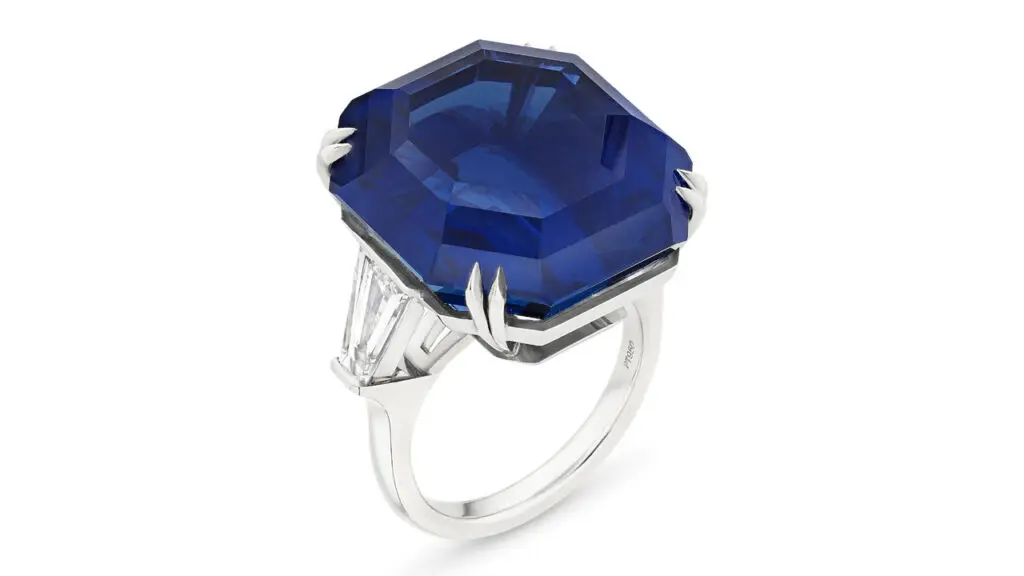 A ring centering an octagonal step-cut, 41.29-carat sapphire between baguette-cut diamonds at Christie's image
