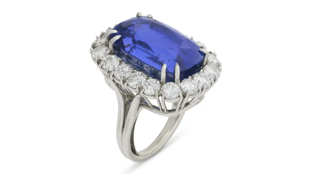 A Harry Winston ring bearing an antique cushion-shaped, 29.95-carat Ceylon sapphire in a surround of round diamonds weighing approximately 2.80 carats at Christie's image