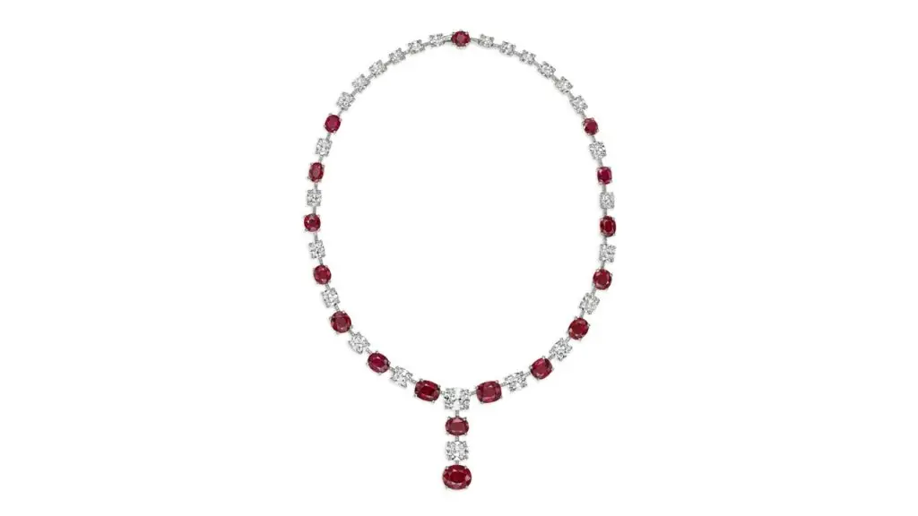 This David Morris necklace comprises oval and cushion mixed-cut Burmese rubies weighing from 1.02 to 5.03 carats, alternating between cushion and round diamonds. The two large diamonds are a 2.23-carat, F, VS2 and a 3.34-carat, F, VVS2 stone at Christie's image