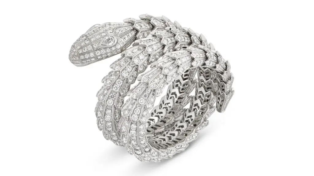 This Bulgari Serpenti bangle features circular-cut diamonds with pear-shaped diamond eyes at Christie's image