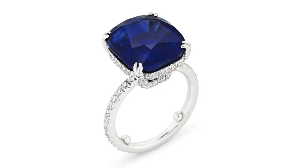 This ring stars a cushion mixed-cut Kashmir sapphire weighing 15.40 carats, embellished with round diamonds at Christie's image