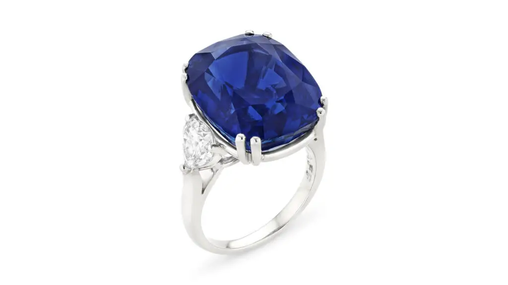 A Graff ring with a cushion mixed-cut, 30-carat Ceylon sapphire between heart-shaped diamonds at Christie's image