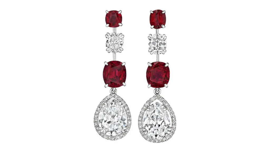 A pair of David Morris earrings with cushion mixed-cut Burmese rubies weighing 1.07, 1.08, 4.10 and 4.26 carats. The jewels feature detachable pendants with modified pear brilliant-cut diamonds — one a 4.20-carat, E-color, VVS2 and the other a 4.23-carat, D, VVS1 stone — and two single-cut diamonds at Christie's image