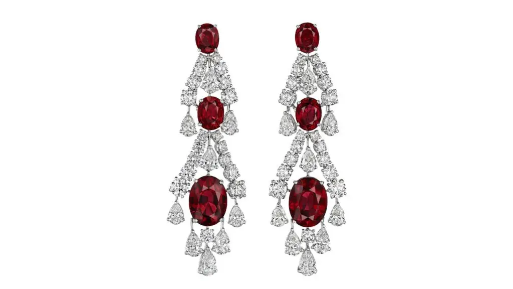 A pair of Graff earrings featuring six oval mixed-cut Burmese spinel weighing a total of 30.11 carats, decorated with pear and round diamonds at Christie's image
