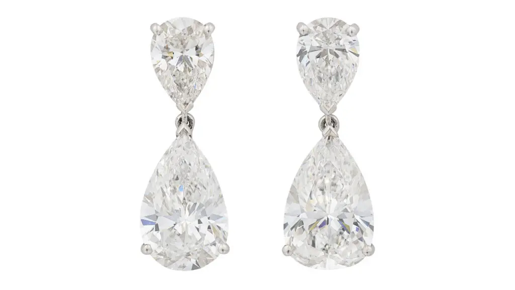 This pair of Graff earrings contains two pear brilliant-cut, D-color, internally flawless diamonds of 3.65 and 3.71 carats suspended from pear-shaped diamonds at Christie's image