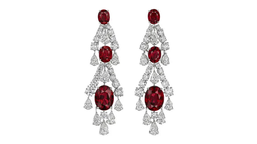 This pair of Graff earrings bears six oval mixed-cut Burmese spinels weighing a total of 30.11 carats, decorated with pear and round diamonds at Christie's image