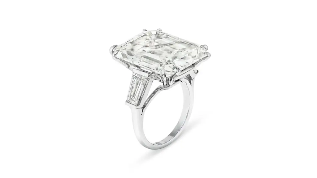 Ring features an emerald-cut, 24.99-carat, J-color, VS1-clarity diamond with baguette-cut diamond shoulders at Christie's image